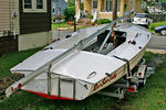 Flying Scot 5661 : Scot 5661 is a 2006 used only three times by the owner.  Unfortunate circumstances has forced him to sell.  The Scot is in perfect condition.  White hull and deck with red waterline and trim stripes.  5661 has the standard race package with many extras.  Outboard bracket, swim ladder & grab rail, rudder lift system, boom topping lift, Schurr Sails, standard and roller furling jib, stainless mast sleeve, red bottom paint, mahogany centerboard cap, and Aluminum Trailex trailer with nose wheel.  Boat New was $16,700.  
Asking $14,195.  New Boat Warranty can be transferred for $100. 